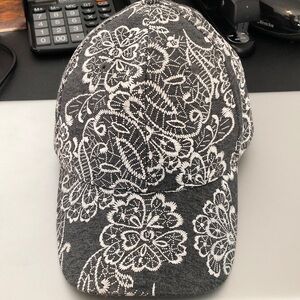 Women’s Darling Baseball Hat in Heather Gray with White Floral Embroidery.